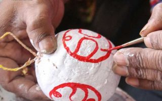 Crafting Beauty from Nature: The Art of Coconut Shell Painting